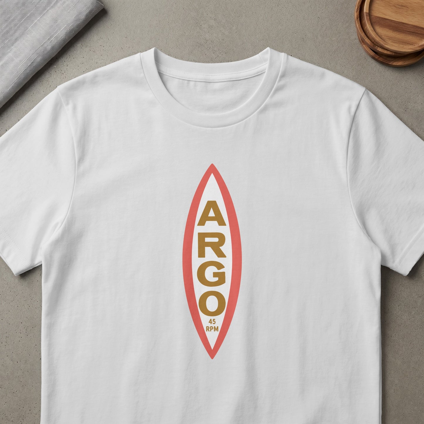 White t-shirt with a red and gold "ARGO 45 RPM" emblem.