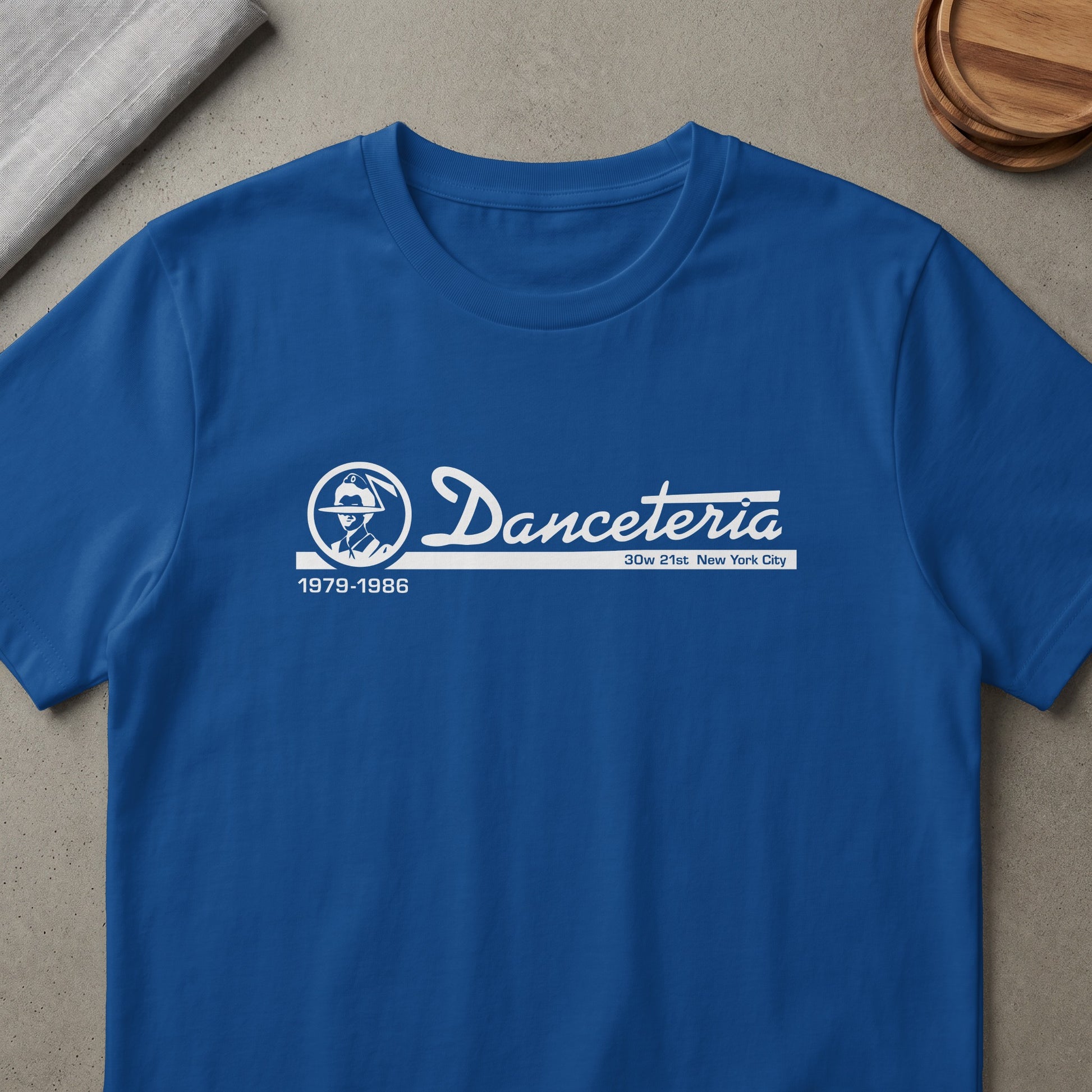 Royal blue t-shirt with white "Danceteria 1979-1986 30w 21st New York City" graphic.