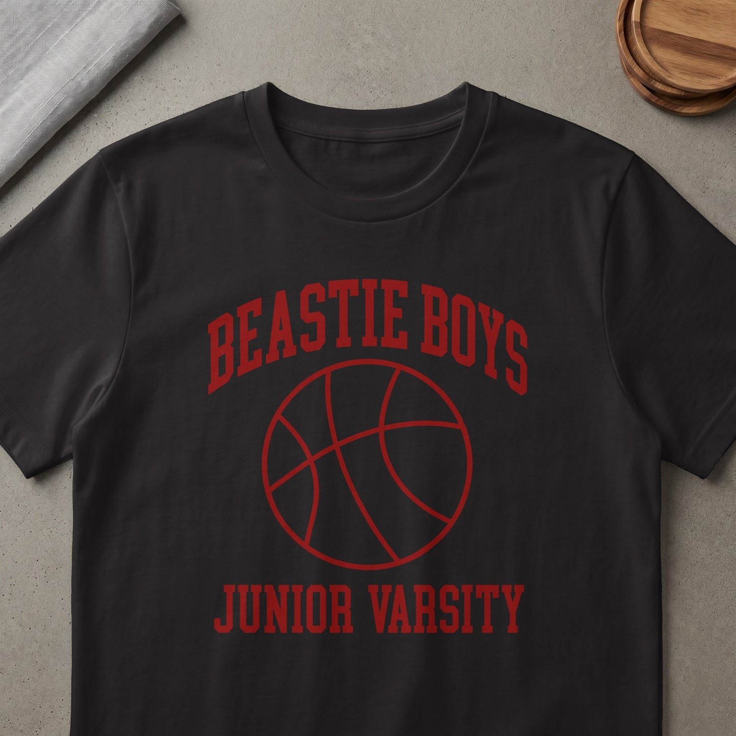 Black t-shirt with red "Beastie Boys Junior Varsity" text and basketball graphic.