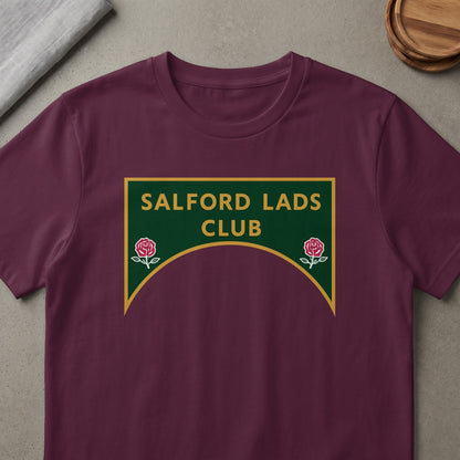 Maroon t-shirt with Salford Lads Club logo featuring roses.