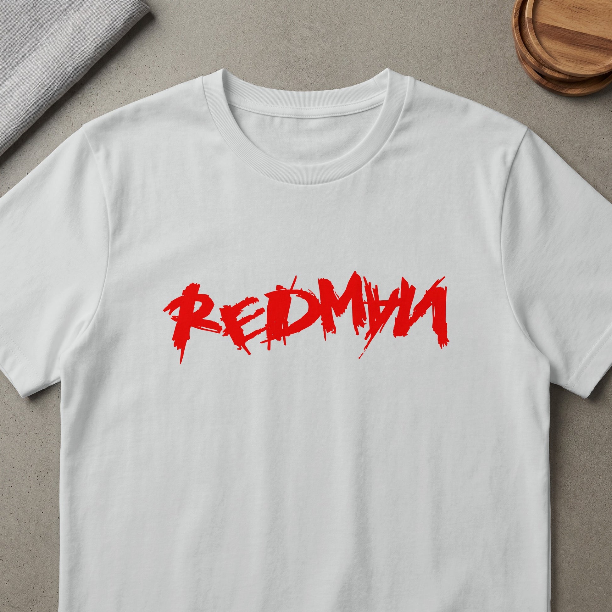 White t-shirt with red "REDMYNA" text logo.