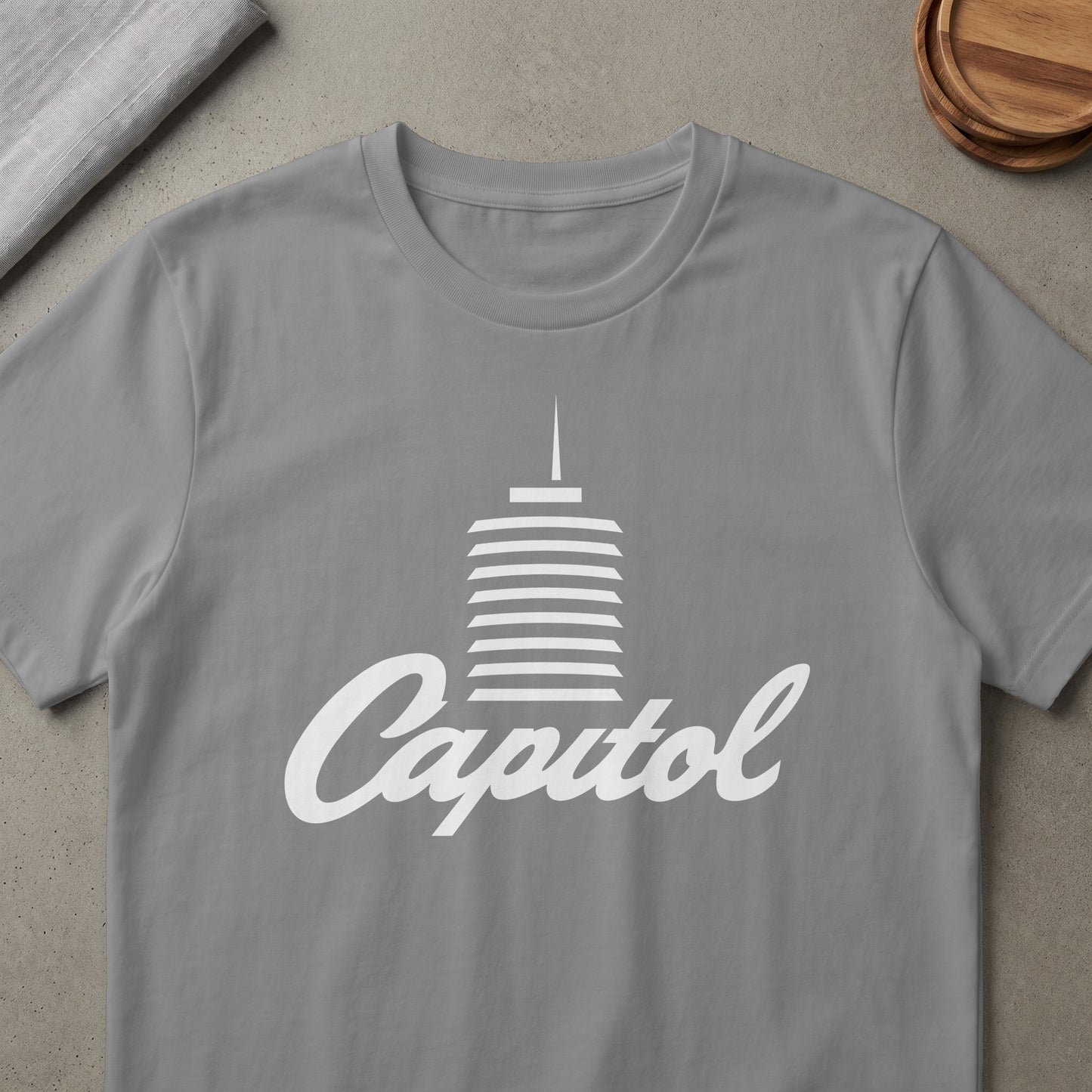 T-shirt with white Capitol Records building logo and script text.