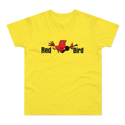 Yellow t-shirt with black text and red bird graphic.
