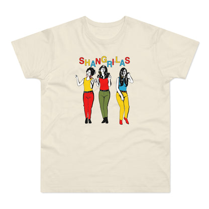 Cream t-shirt with colorful text "SHANG-R-ILAS" and three women graphic.