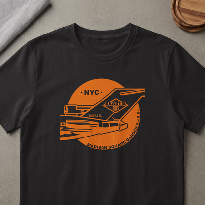 Black t-shirt with orange graphic of a jet, Beastie Boys, NYC, 3MTA3 DJ, and Madison Square Garden 8.20.87.