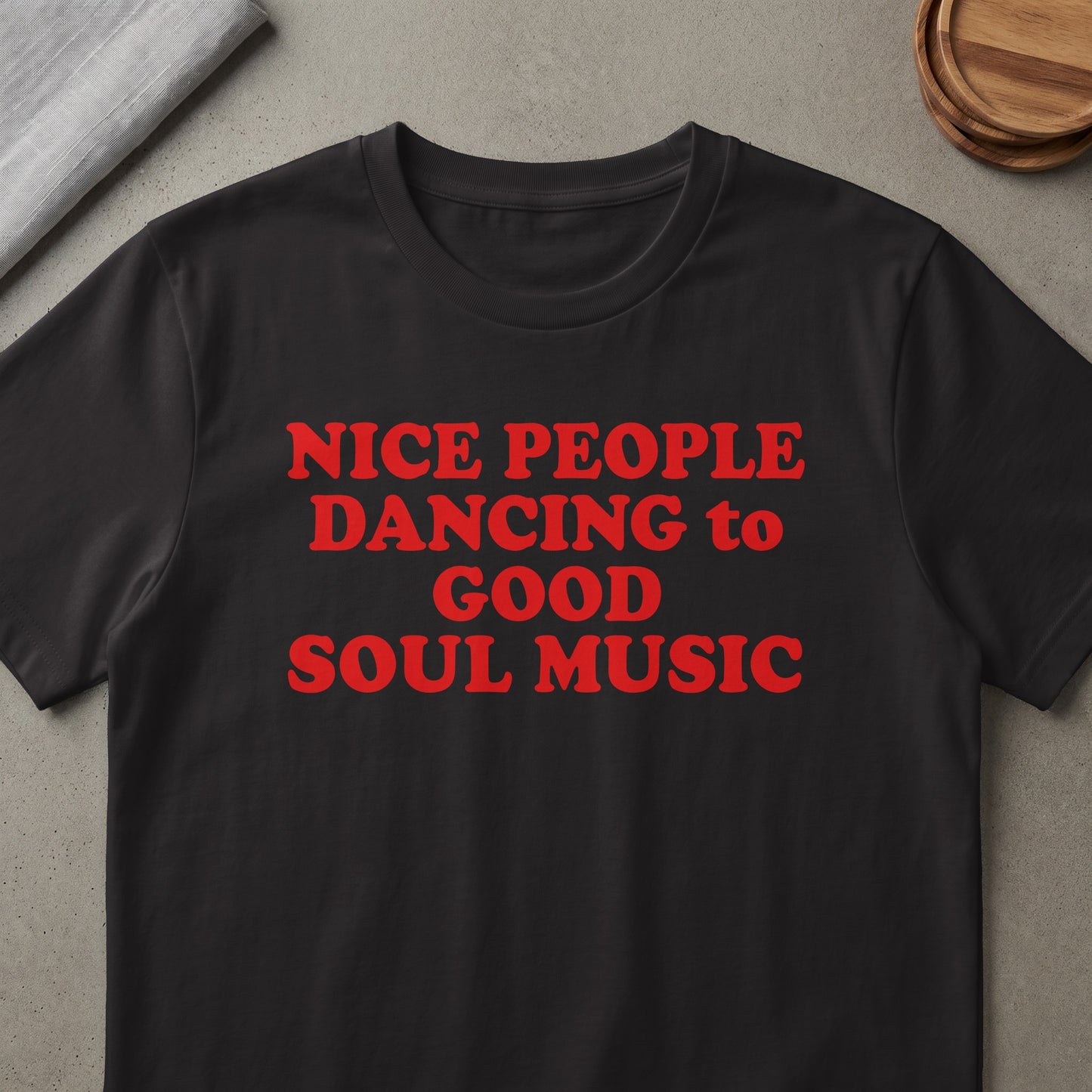 Black t-shirt with red text reading "NICE PEOPLE DANCING to GOOD SOUL MUSIC".