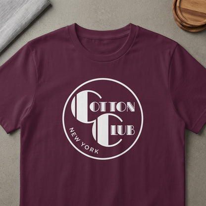 Maroon t-shirt with white circular logo featuring "COTTON CLUB NEW YORK"