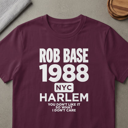 Maroon t-shirt with "ROB BASE 1988 NYC HARLEM YOU DON'T LIKE IT SO WHAT I DON'T CARE" printed in white.