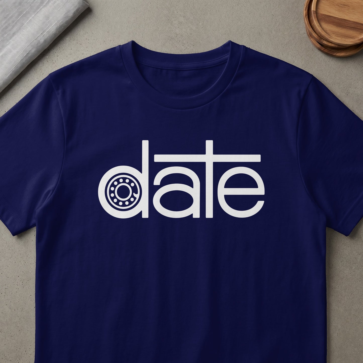 Navy t-shirt with white "date" text, featuring a bearing graphic in place of the "a".