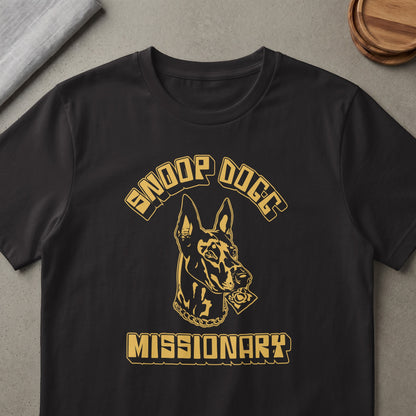 Black t-shirt with gold graphic of a dog head with Snoop Dogg text and Missionary text.