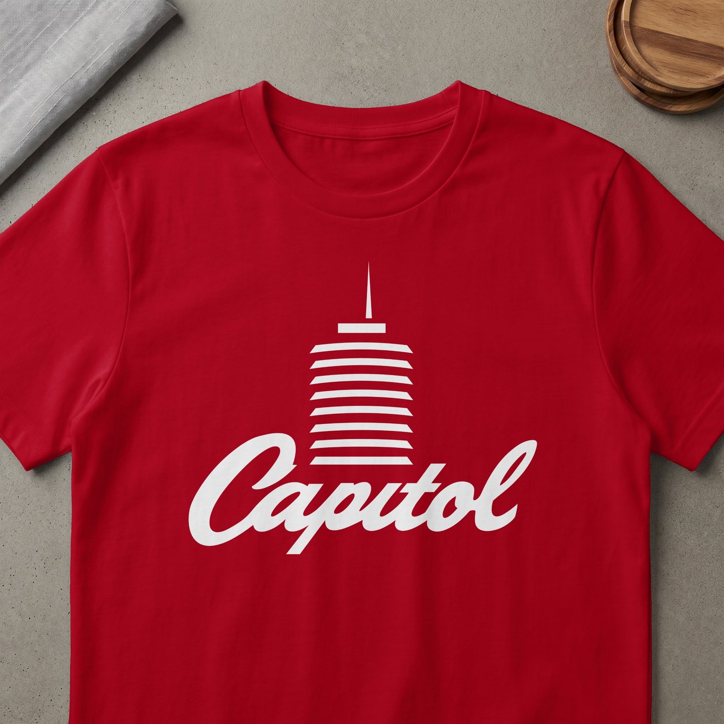 Red t-shirt with white Capitol Records building logo and script text.