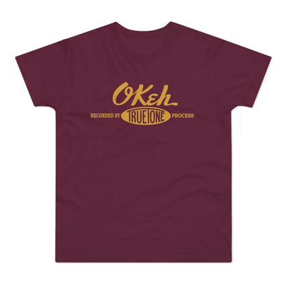 Maroon t-shirt with yellow "Okeh Recorded by True One Process" logo.