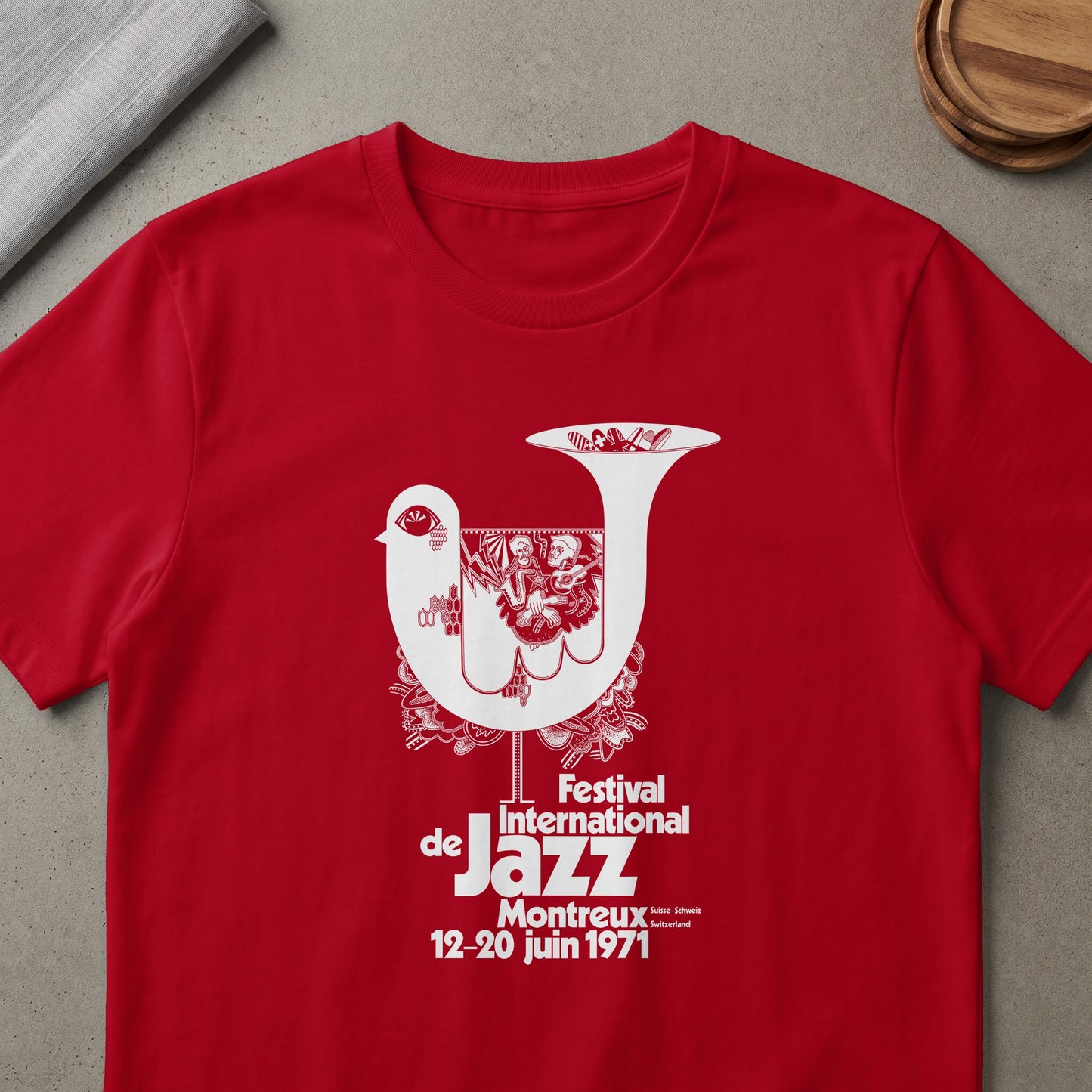 Red t-shirt with white 1971 Montreux Jazz Festival bird graphic and text.