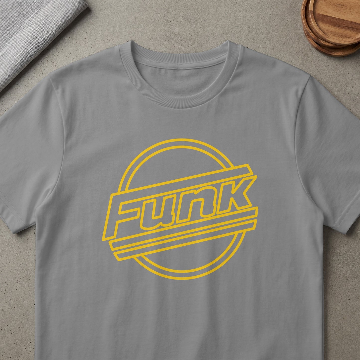 Gray t-shirt with yellow "Funk" text inside a circular, retro design.