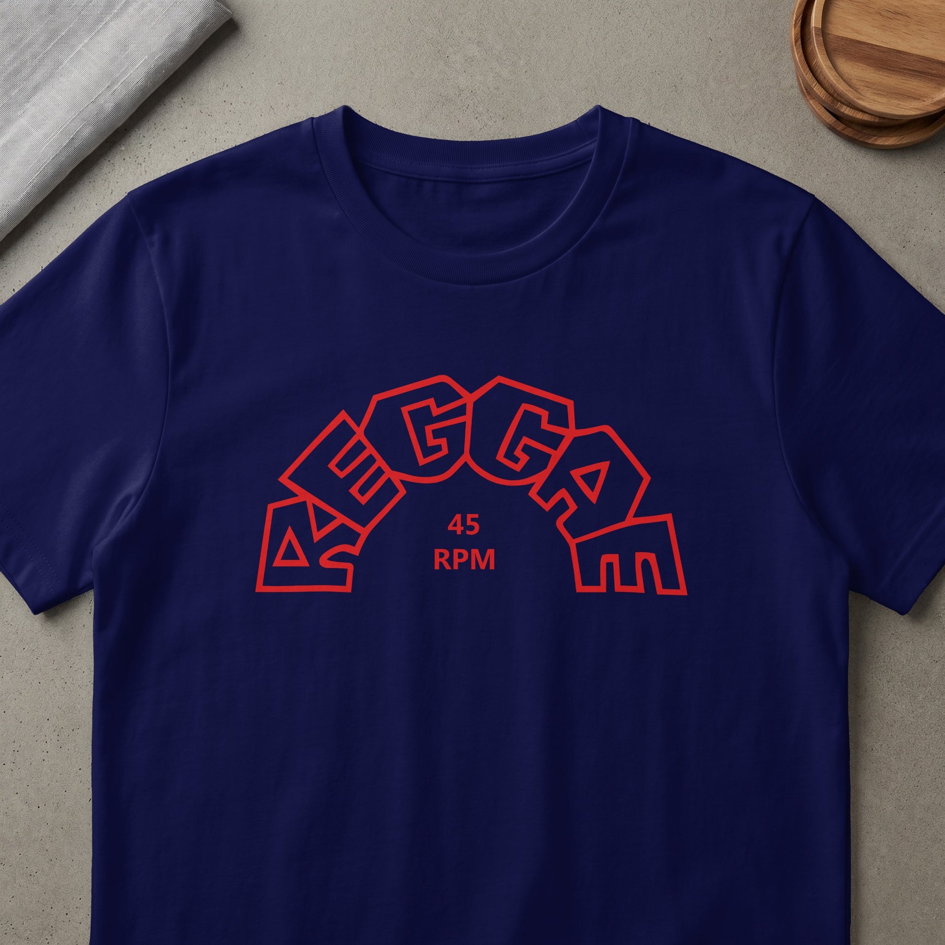 Navy t-shirt with red "REGGAE 45 RPM" text in an arched design.