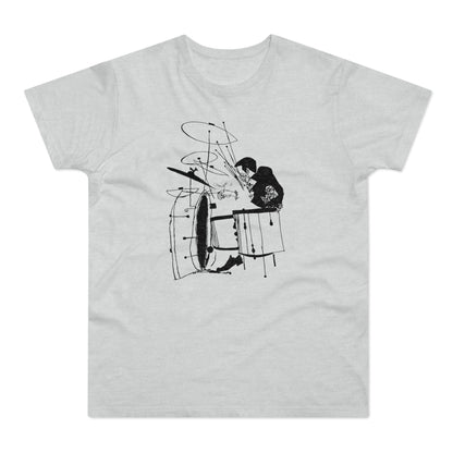 Black ink drawing of a drummer playing a drum set on a light gray t-shirt.