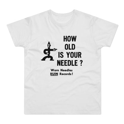White t-shirt with black text "HOW OLD IS YOUR NEEDLE?" and an illustration of a record player needle.