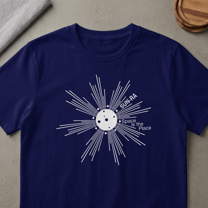 Navy t-shirt with white Sun-Ra "Space is the Place" graphic.