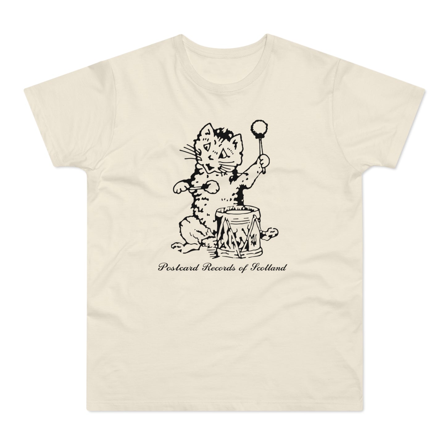 Cream t-shirt with a black, ink-style drawing of a cat playing a drum, with text.