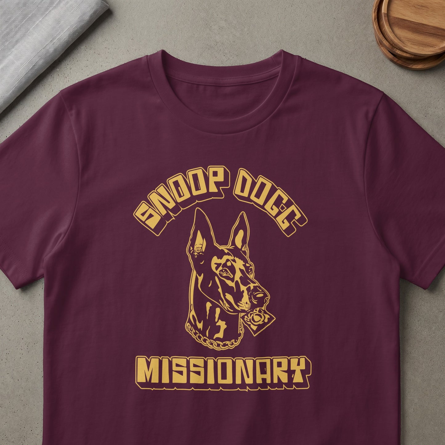 Maroon t-shirt with "Snoop Dogg" and a dog holding a condom, "Missionary" text.