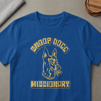 Blue t-shirt with yellow Snoop Dogg Missionary graphic of a dog's head and text.