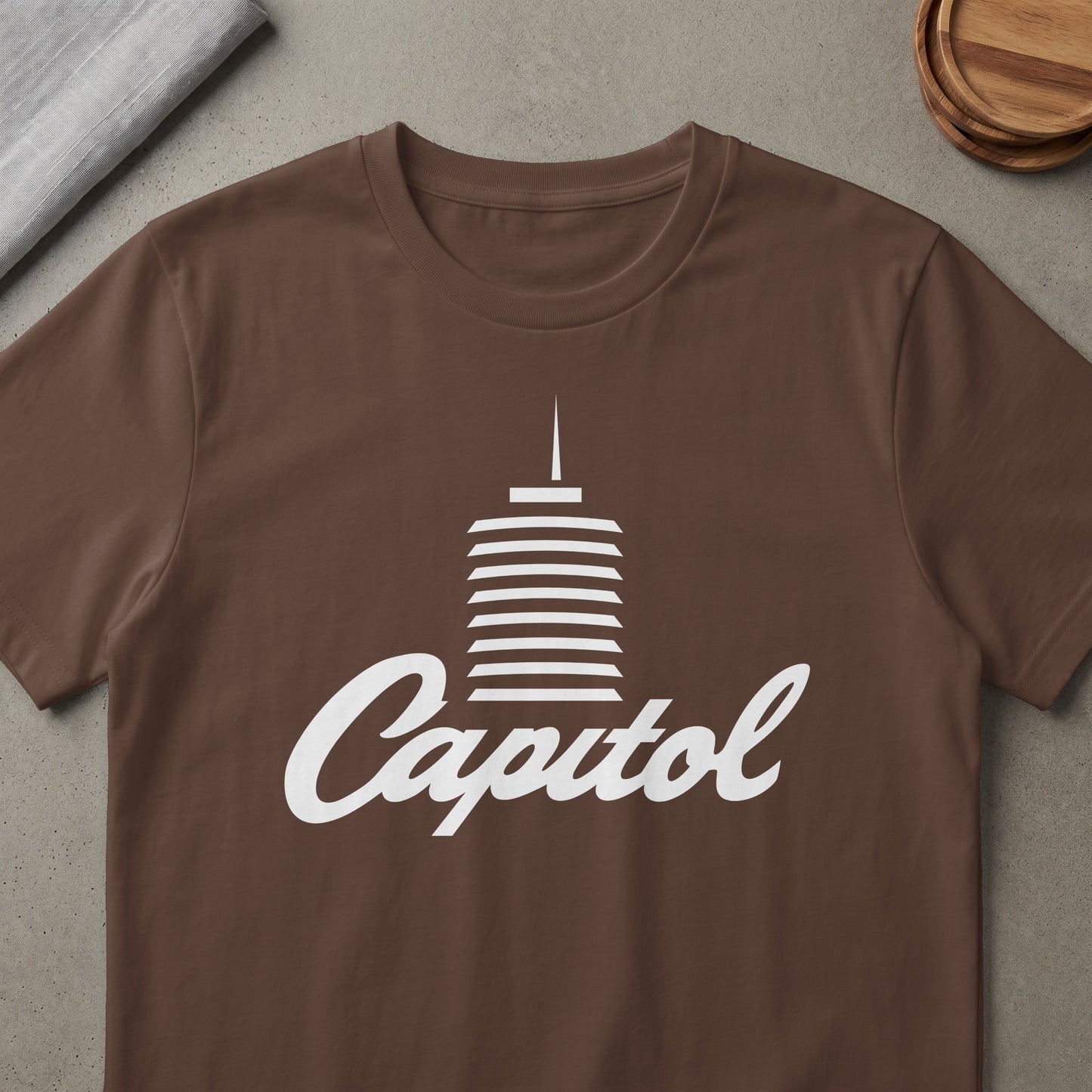 Brown t-shirt with white Capitol Records building logo and text.