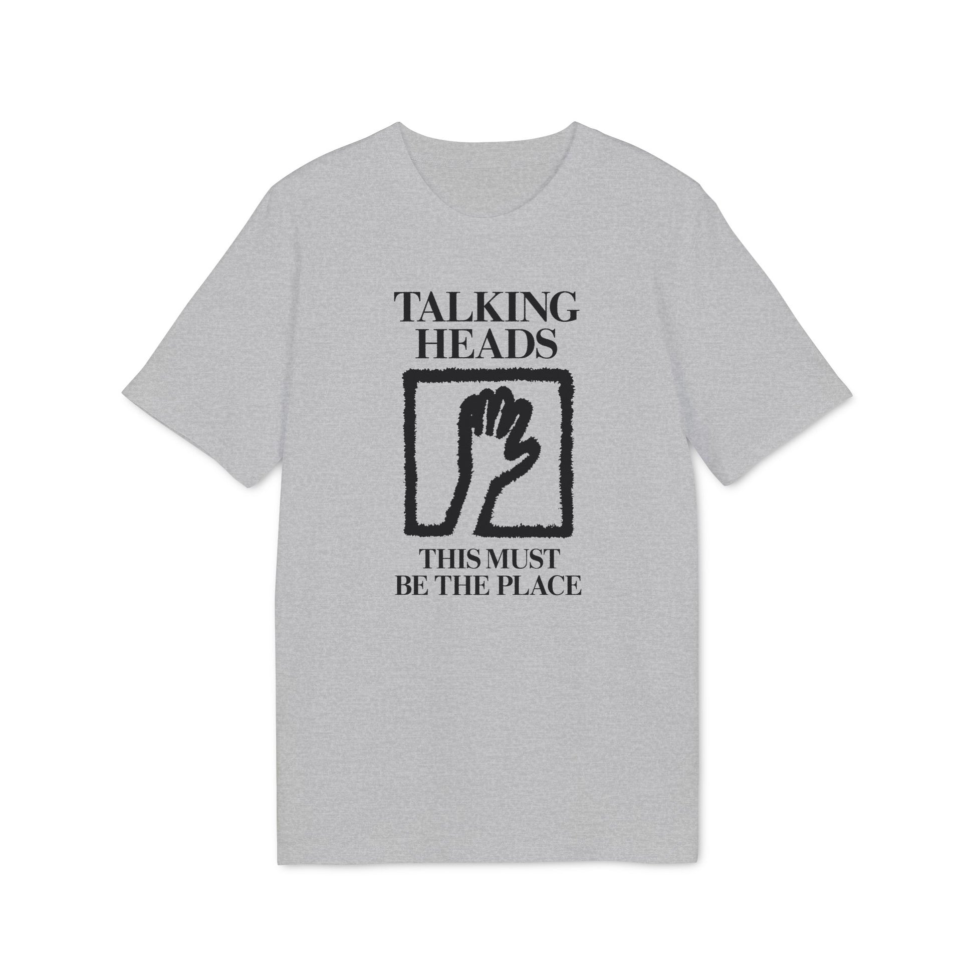 Grey t-shirt with "Talking Heads" and "This Must Be The Place" text and a hand icon.
