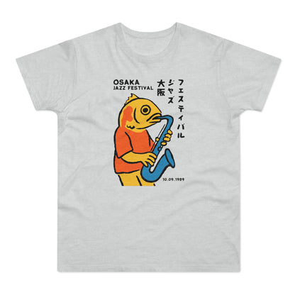 Light grey t-shirt with Osaka Jazz Festival graphic of a yellow fish playing a saxophone.