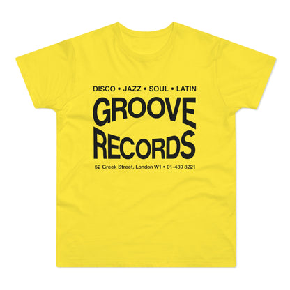 Yellow t-shirt with black text "Groove Records" and address.