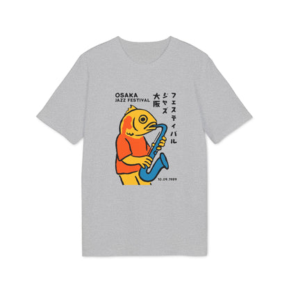 Yellow fish in orange shirt plays blue saxophone, "Osaka Jazz Festival" text, 10.09.1989 date.