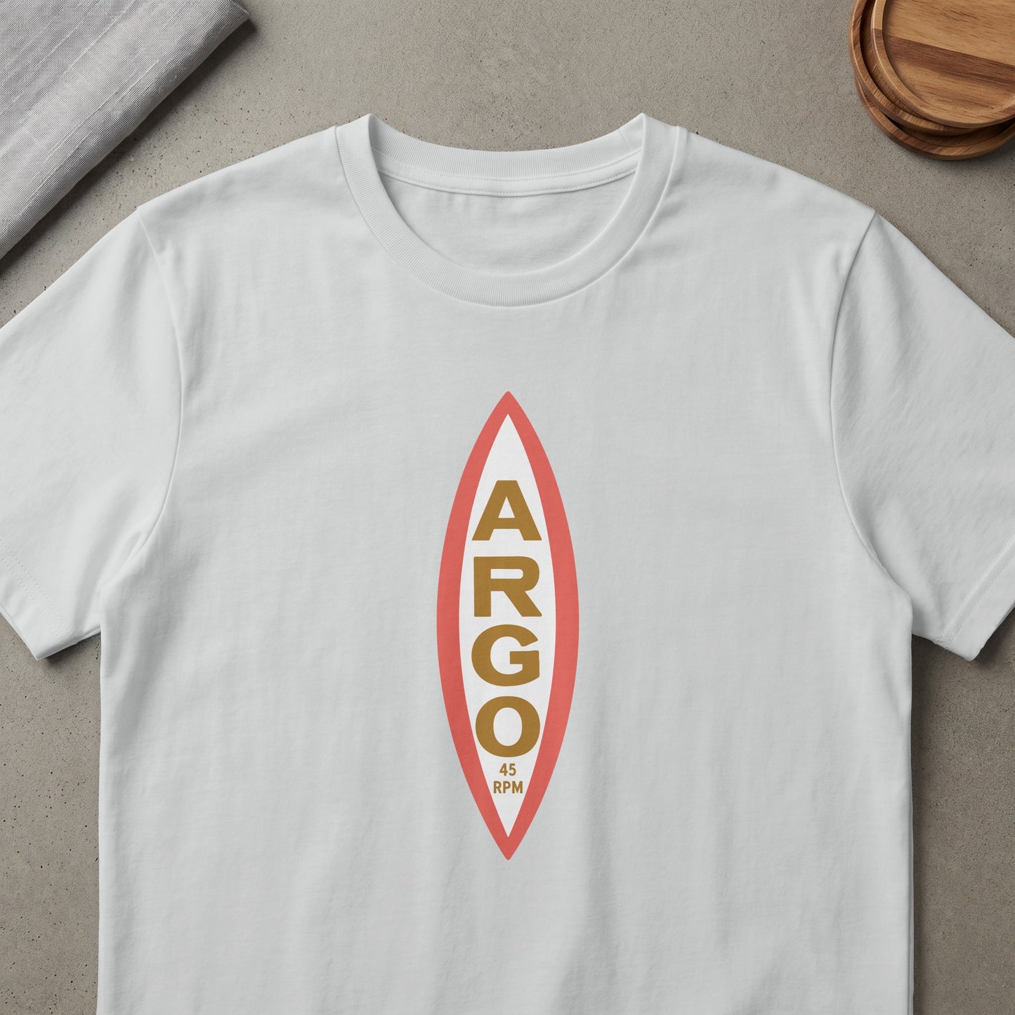 White t-shirt with a red and gold surfboard logo with "ARGO 45 RPM".