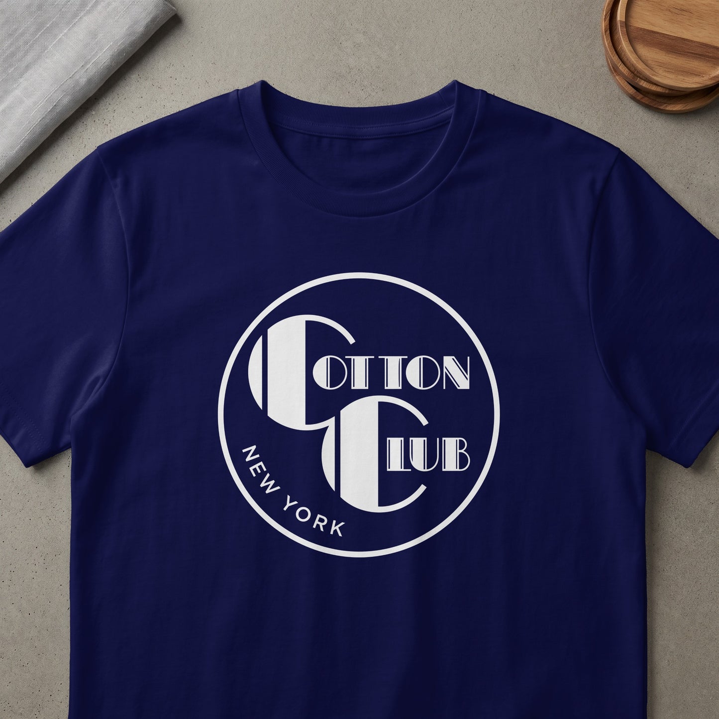 Navy t-shirt with white "Cotton Club New York" circular logo design