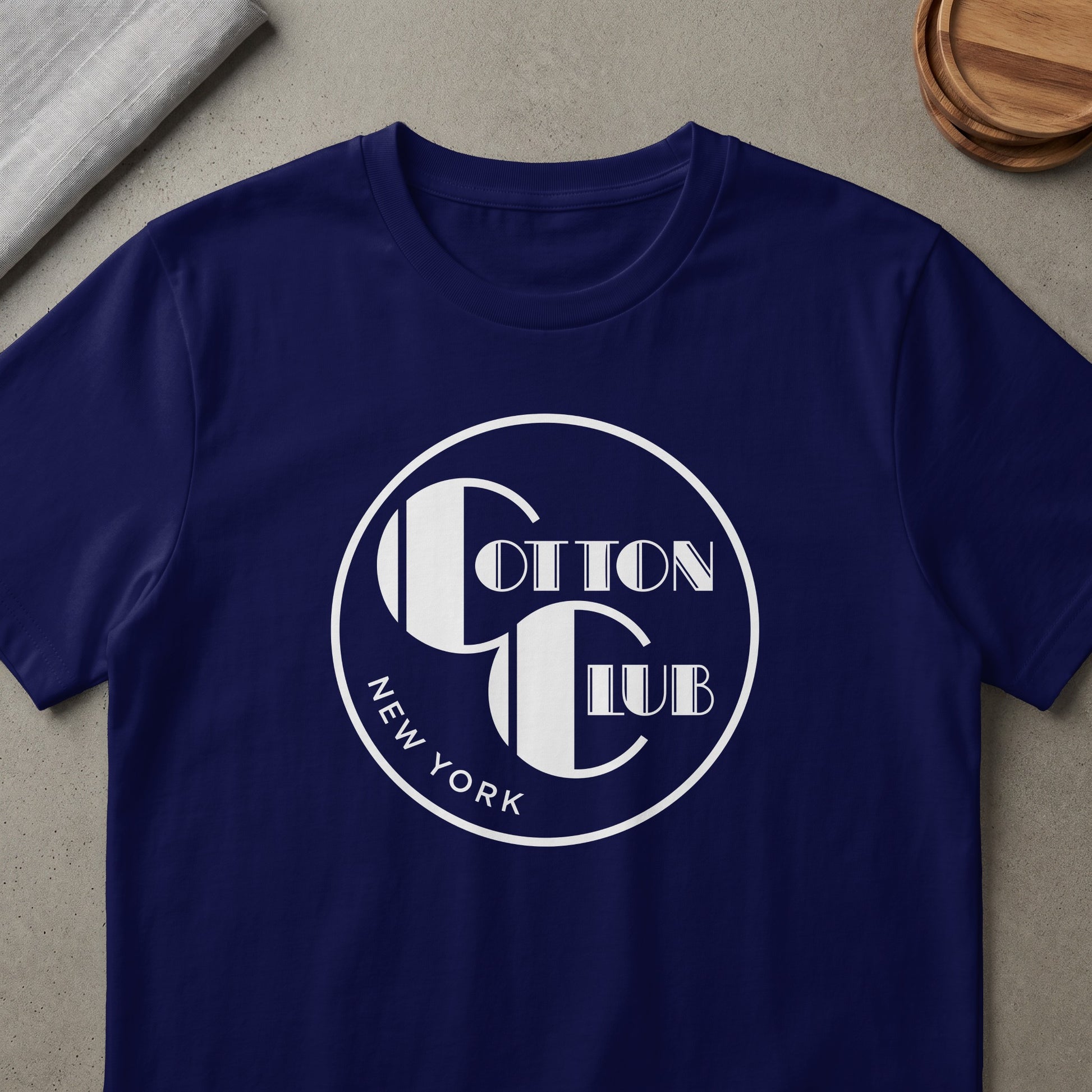 Navy t-shirt with white "Cotton Club New York" circular logo design