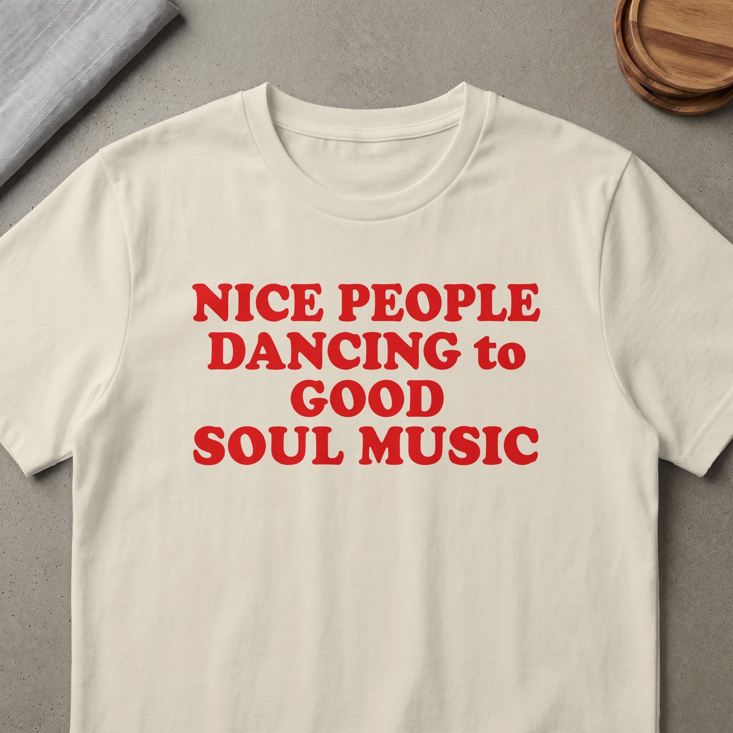 Cream t-shirt with red text reading "NICE PEOPLE DANCING to GOOD SOUL MUSIC".