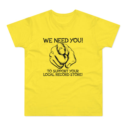 Yellow t-shirt with black text "We Need You!" and pointing finger graphic.