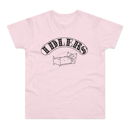 Pink t-shirt with black text "FIDDLERS" and a drawing of a person in bed.