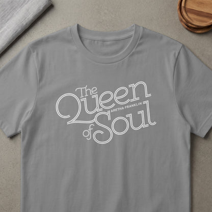 Grey t-shirt with white text "The Queen of Soul Aretha Franklin."