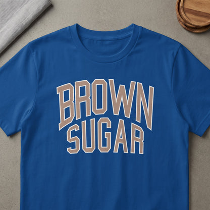Blue t-shirt with "BROWN SUGAR" text in tan and white letters.