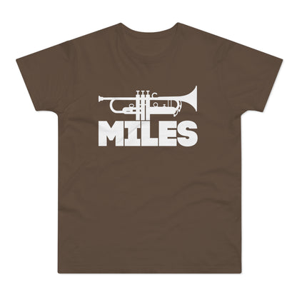 Brown t-shirt with white trumpet graphic and "MILES" text.