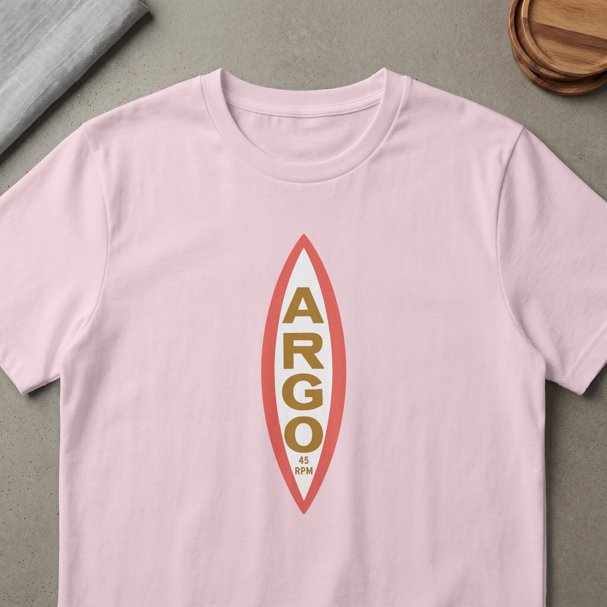 Pink t-shirt with vertical ARGO 45 RPM logo on a dart shape.