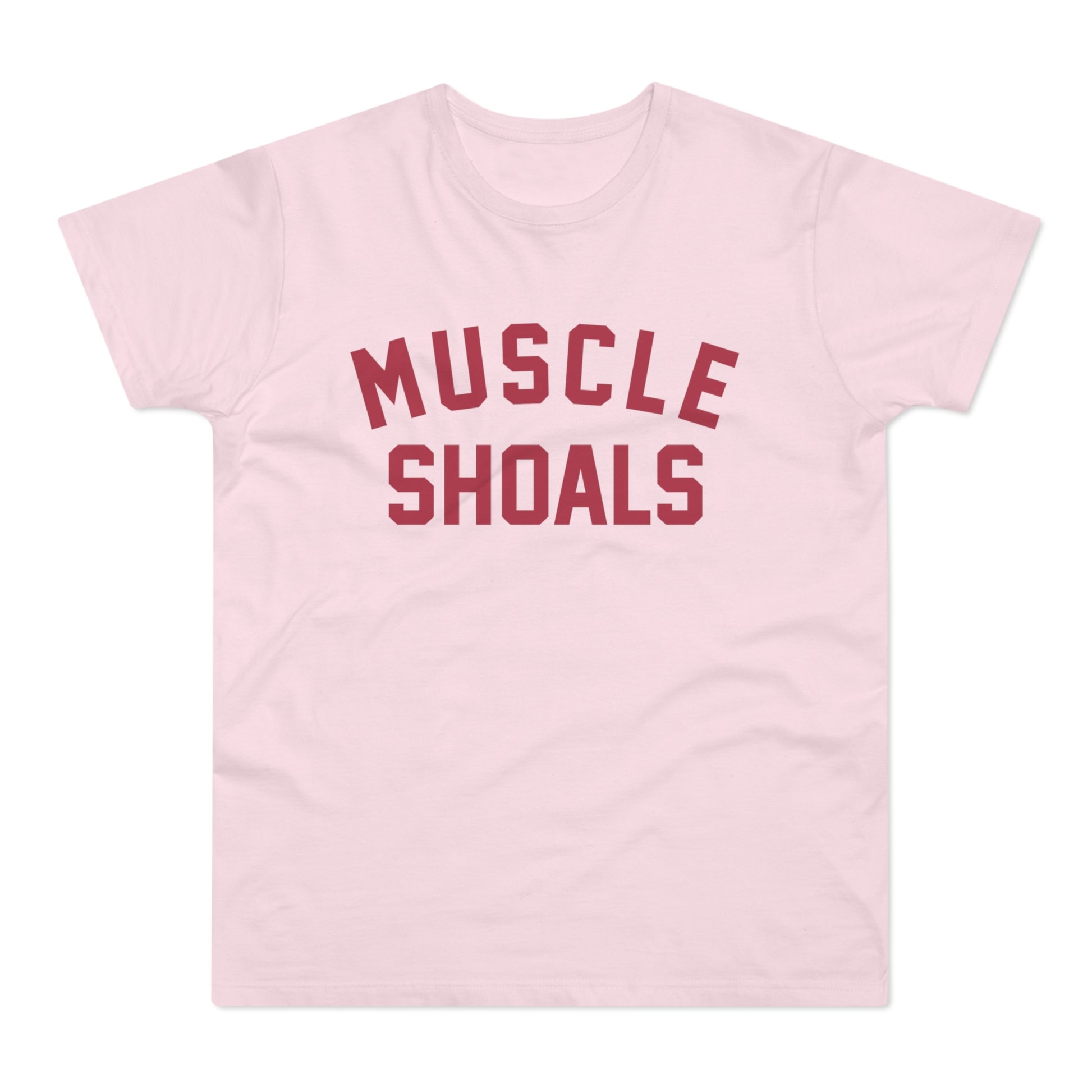 Pink t-shirt with dark red "MUSCLE SHOALS" lettering.