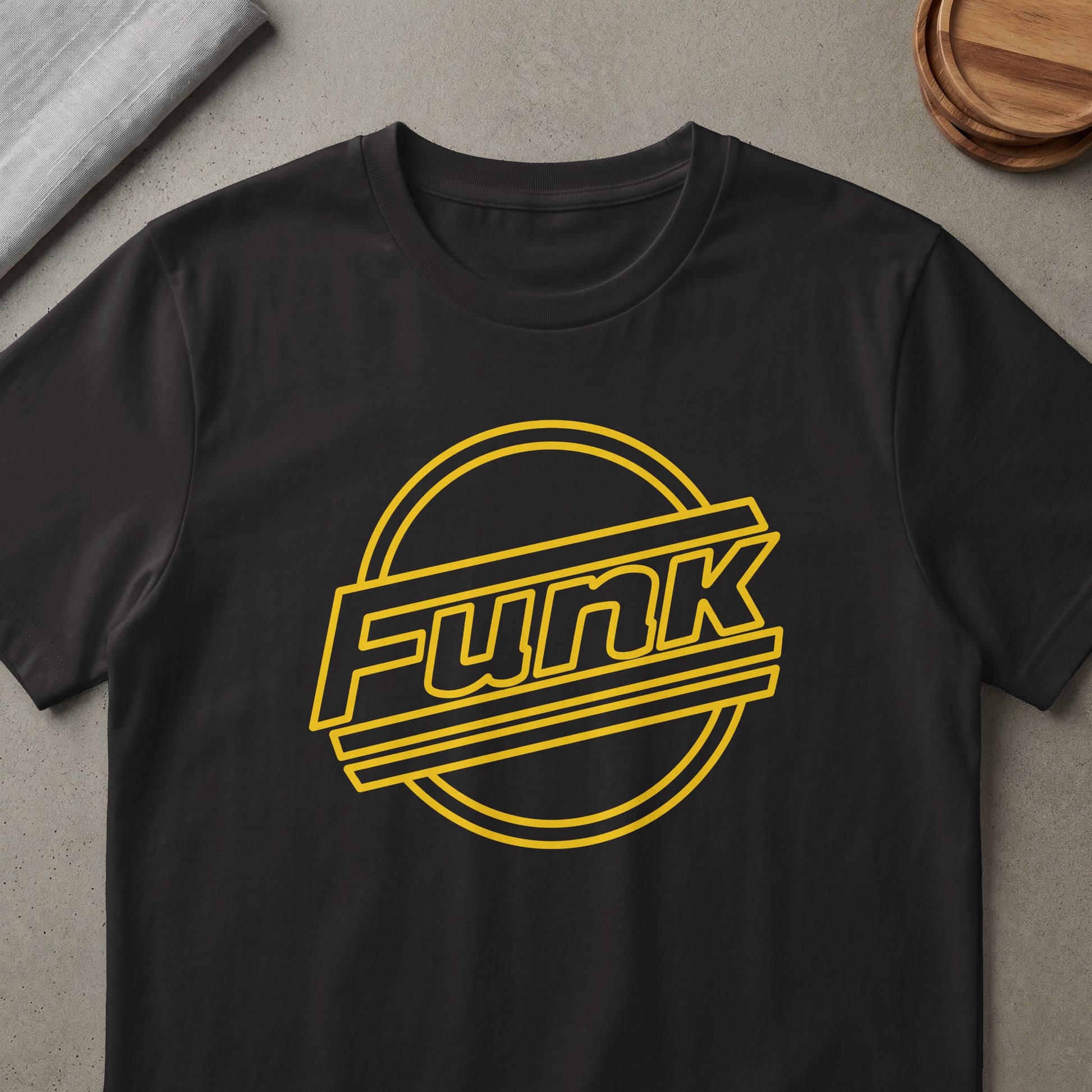 Black t-shirt with yellow "Funk" text inside a circular graphic.