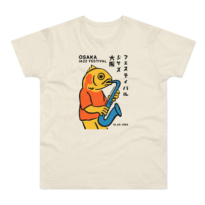 Cream t-shirt with Osaka Jazz Festival text and illustration of a goldfish playing saxophone.