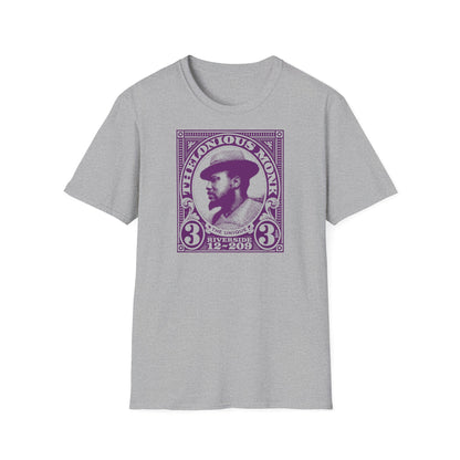 Thelonious Monk portrait graphic on a grey t-shirt.