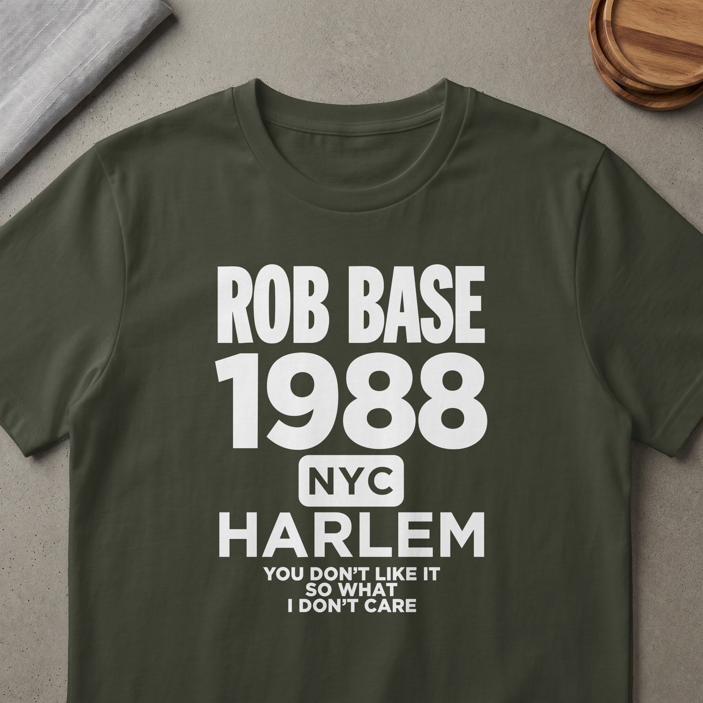 Olive green t-shirt with white text: ROB BASE 1988 NYC HARLEM YOU DON'T LIKE IT SO WHAT I DON'T CARE.
