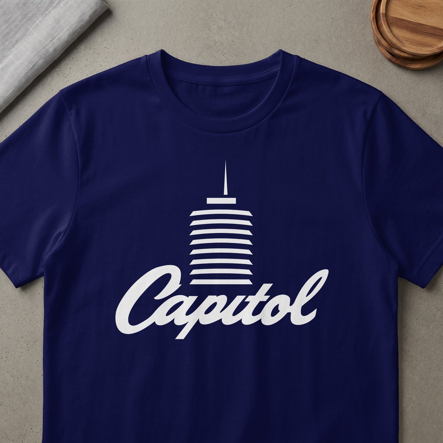 Navy t-shirt with white Capitol Records building logo and text.