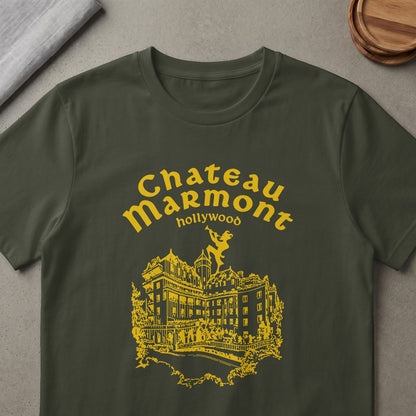 Chateau Marmont Hollywood graphic on a dark green t-shirt.