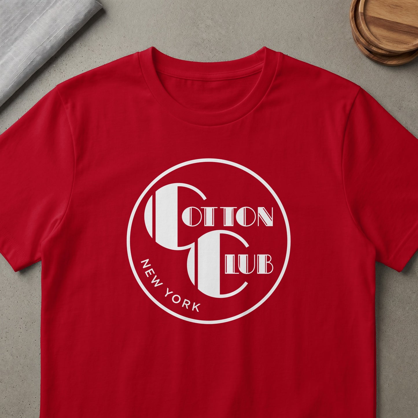 Red t-shirt with white Cotton Club New York logo and lettering.