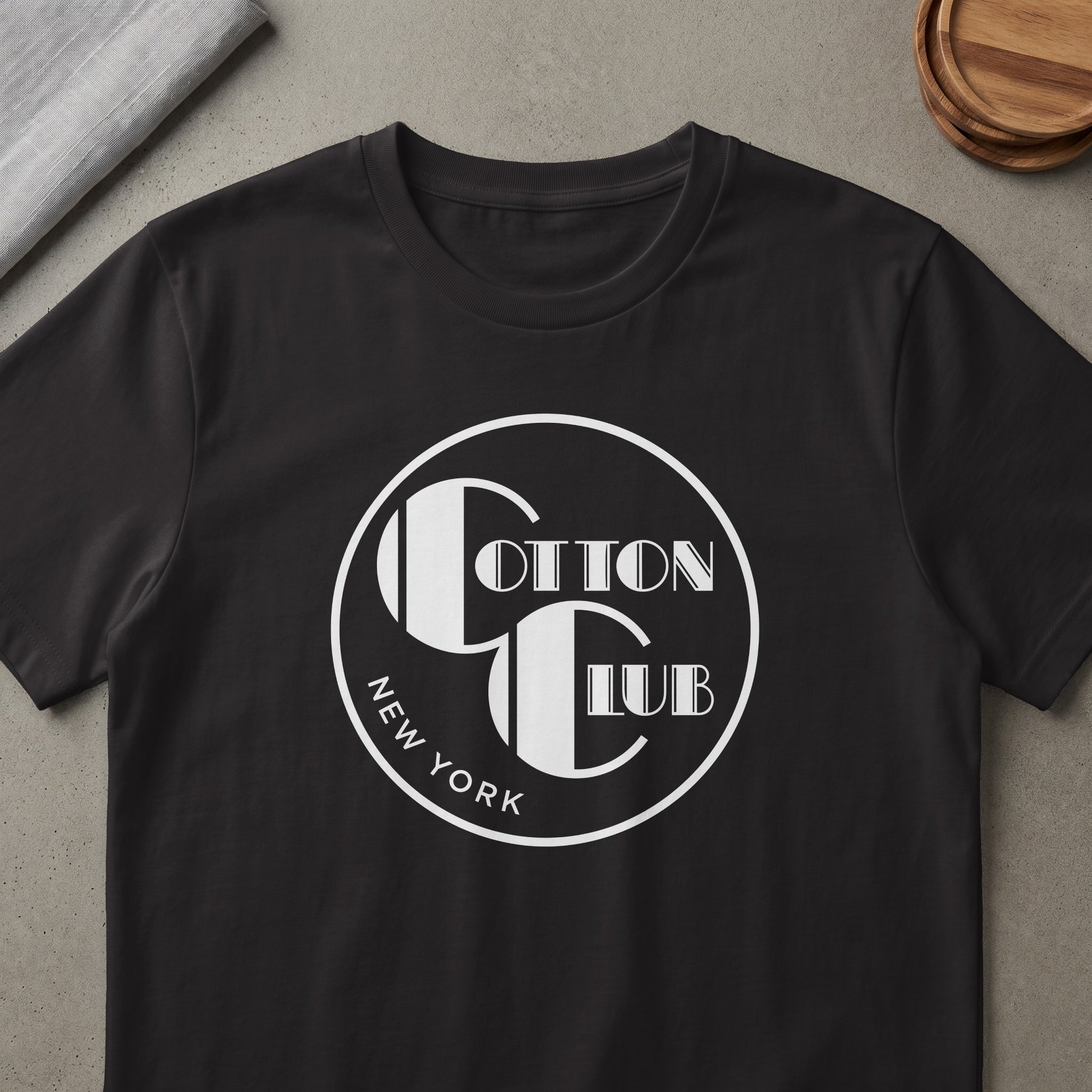 Black t-shirt with white "Cotton Club New York" text and logo.