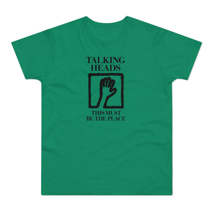 Green t-shirt with "Talking Heads" above a hand in a square and "This Must Be The Place".